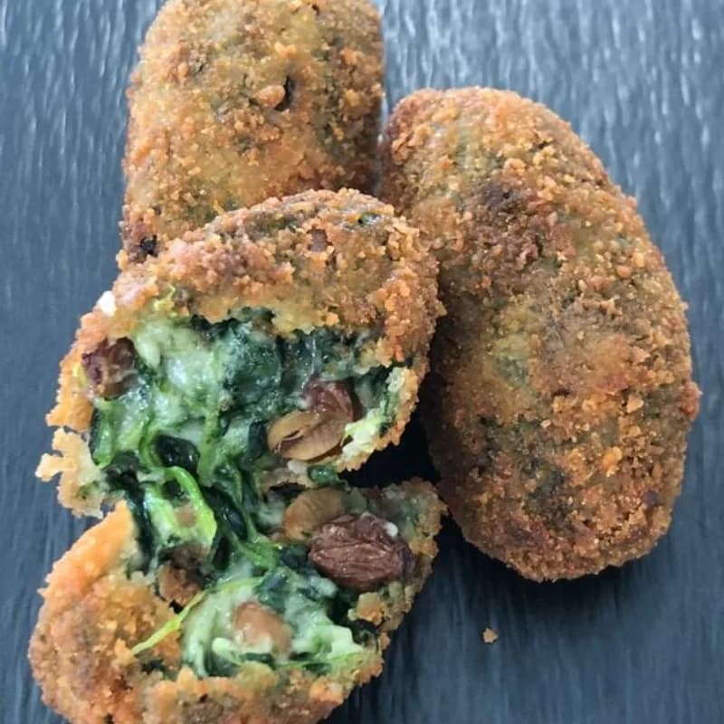 Vegana de Espinacas, Pasas y Piñones